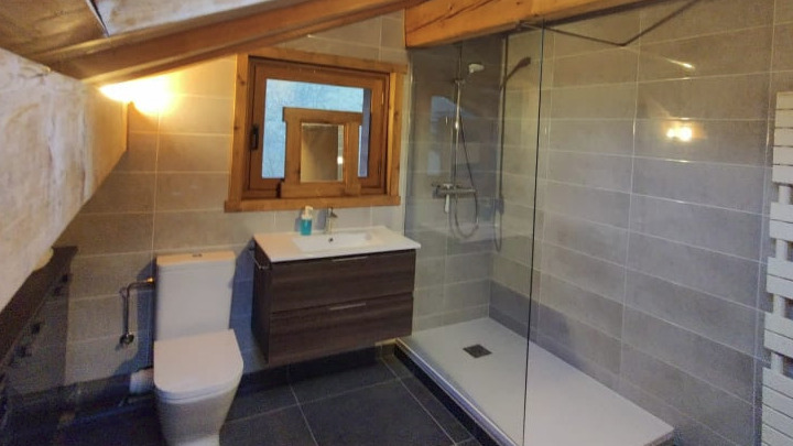 Large top floor bathroom with shower and bath